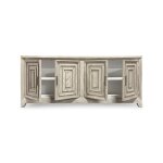Distressed wood sideboard with open paneled doors
